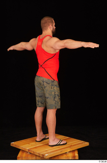 Dave camo shorts red tank top sandals standing t poses…